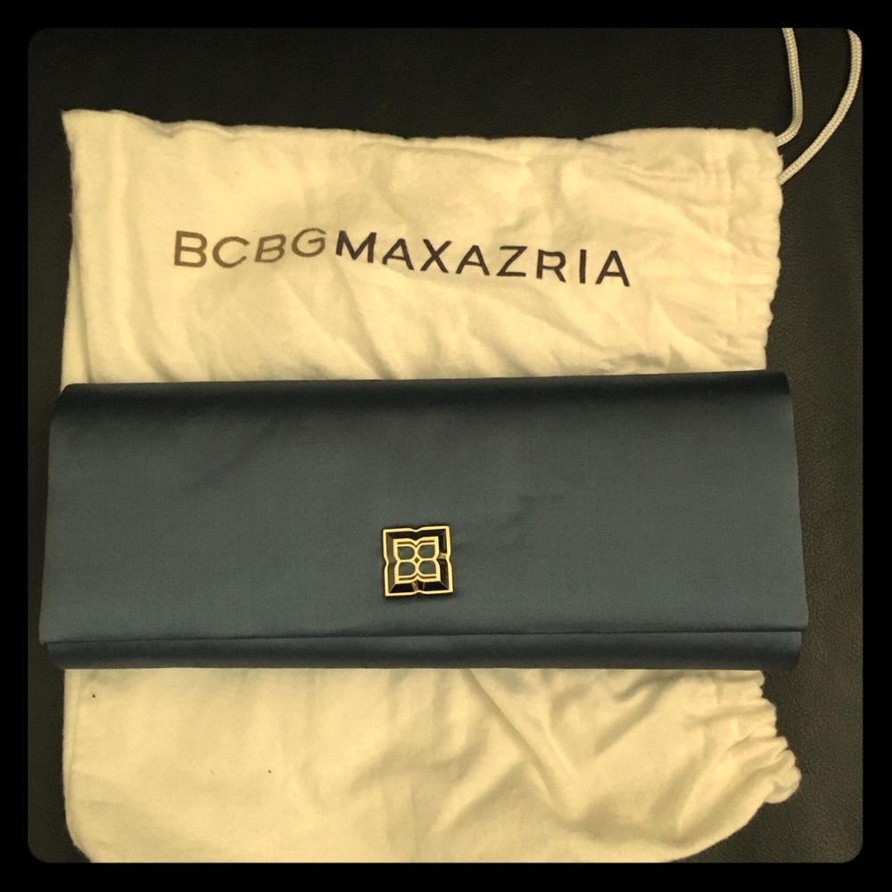 NWOT BCBG clutch Excellent condition 11”x4.5”x1”